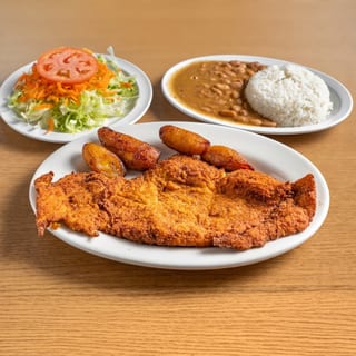 Chuleta De Pollo Empanizada